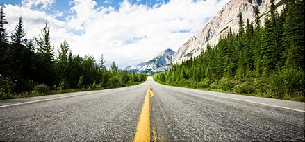 Straight highway through Canadian Rockies