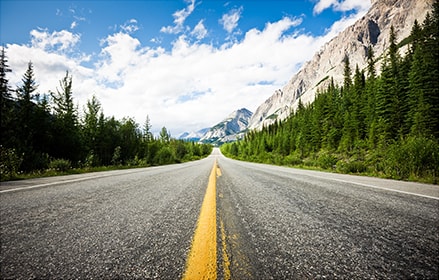 Straight highway through Canadian Rockies