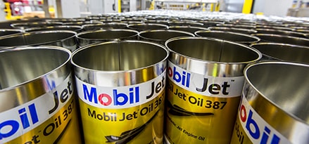 Cans of Mobil Jet oil without lids