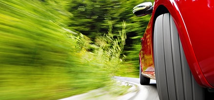 Car turning through bend