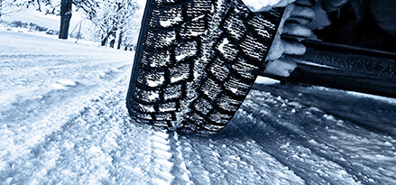 car tire on a snowy road